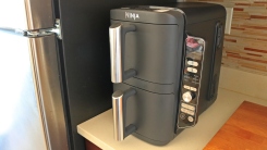 A ninja DoubleStack air fryer on a kitchen counter.
